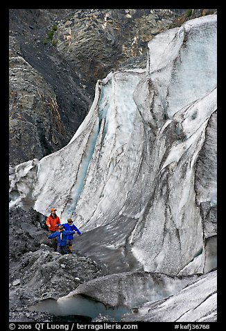 Man and children hiking on moraine at the base of Exit Glacier. Kenai Fjords National Park (color)