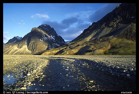 Wide gravel river bar below the Telaquana Mountains, sunset. Lake Clark National Park (color)