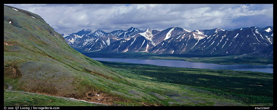 Summer mountain landscape with cloudy skies. Lake Clark National Park, Alaska, USA.