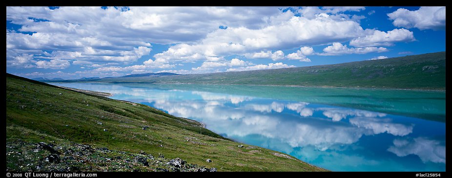 Turquoise Lake reflecting clouds. Lake Clark National Park, Alaska, USA.
