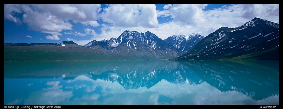 Clouds and mountains reflected in Turquoise Lake. Lake Clark National Park, Alaska, USA.