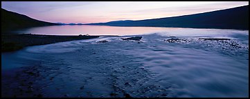 Wide stream flowing into lake at sunset. Lake Clark National Park (Panoramic color)