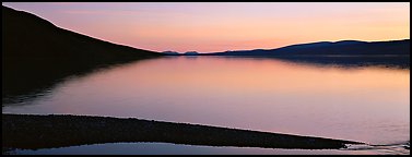 Lake reflecting sunset colors. Lake Clark National Park (Panoramic color)