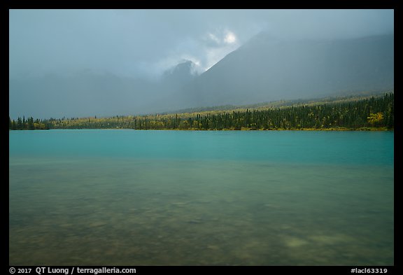 Turquoise waters and rain, Kontrashibuna Lake. Lake Clark National Park, Alaska, USA.