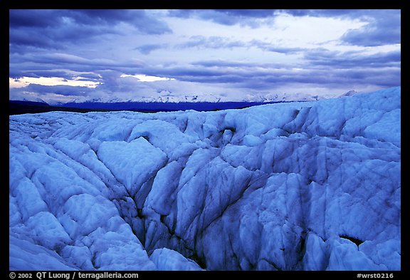 Crevasses on Root glacier at dusk, Chugach mountains in the background. Wrangell-St Elias National Park (color)