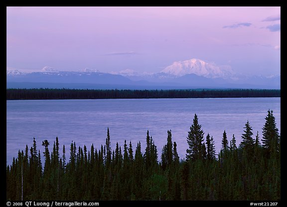 Wrangell range and Mt Blackburn above Willow Lake with pink sunset hues. Wrangell-St Elias National Park, Alaska, USA.