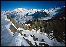 Corniche and view of glaciers and Mt Blackburn range. Wrangell-St Elias National Park, Alaska, USA.