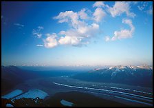 Kennicott Glacier, Chugach mountains, and clouds from Mt Donoho, sunrise. Wrangell-St Elias National Park, Alaska, USA.