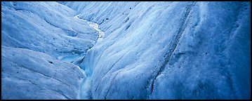 Stream and ice close-up on glacier. Wrangell-St Elias National Park (Panoramic color)