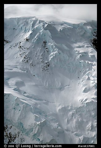Aerial view of icy face with hanging glaciers and seracs. Wrangell-St Elias National Park (color)