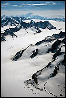Aerial view of mountains with Mt St Elias in background. Wrangell-St Elias National Park, Alaska, USA. (color)
