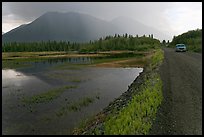 McCarthy Road and lake during afternoon storm. Wrangell-St Elias National Park, Alaska, USA. (color)