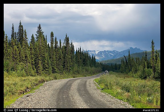 McCarthy road with vehicle approaching in the distance. Wrangell-St Elias National Park (color)