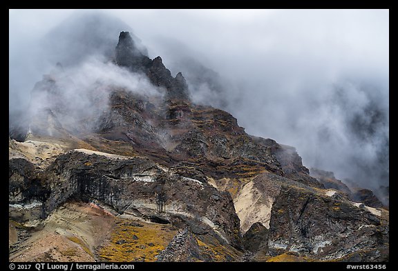 Volcanic spires emerging from clouds, Skookum Volcano. Wrangell-St Elias National Park (color)