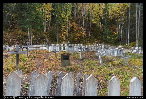 Headstone and wooden crosses at various angles, Kennecott cemetery. Wrangell-St Elias National Park, Alaska, USA.