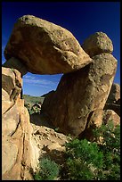 Arch formed by balanced boulder, Grapevine mountains. Big Bend National Park, Texas, USA.