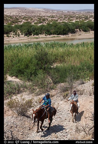 Mexican horsemen from Boquillas Village. Big Bend National Park (color)