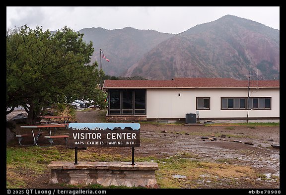 Chisos Basin visitor center backed by misty, cloud-wrapped mountains.. Big Bend National Park (color)