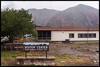 Chisos Basin visitor center backed by misty, cloud-wrapped mountains.. Big Bend National Park ( color)