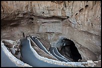Tourists walking down natural entrance. Carlsbad Caverns National Park, New Mexico, USA. (color)