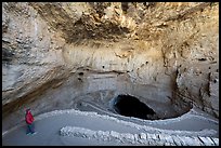 Visitor Looking, paved switchbacks into the natural entrance. Carlsbad Caverns National Park ( color)