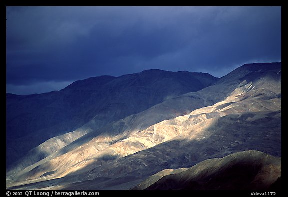 Storm light on foothills. Death Valley National Park (color)