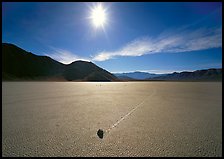 Sun and sliding rock on the Racetrack, mid-day. Death Valley National Park, California, USA. (color)