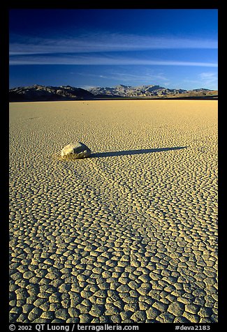 Tracks, sliding stone on the Racetrack playa, late afternoon. Death Valley National Park (color)