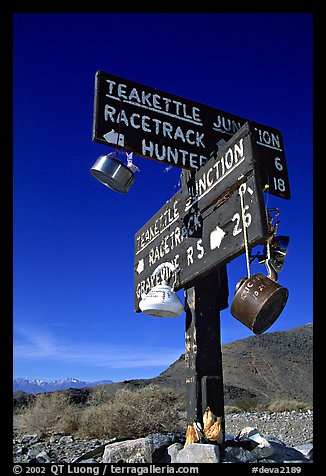 Tea kettle Junction sign, adorned with tea kettles. Death Valley National Park (color)