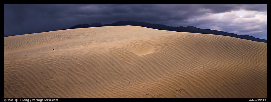 Dune and mountain in stormy weather. Death Valley National Park (color)