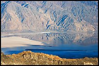 Rare seasonal lake on Death Valley floor and Black range, seen from above, late afternoon. Death Valley National Park, California, USA. (color)