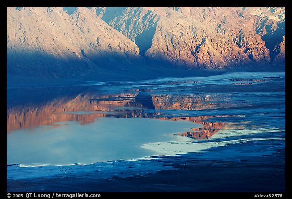 Reflections in Manly Lake at Badwater, seen from Aguereberry point, late afternoon. Death Valley National Park (color)