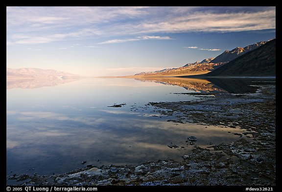 Flooded Badwater basin and Black mountain reflections, early morning. Death Valley National Park, California, USA.