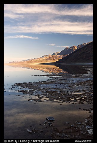 Black mountain reflections in flooded Badwater basin, early morning. Death Valley National Park (color)