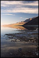 Black mountain reflections in flooded Badwater basin, early morning. Death Valley National Park ( color)