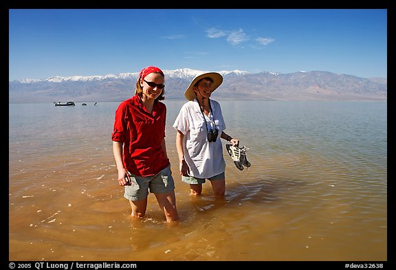 Women wading in the knee-deep seasonal lake. Death Valley National Park (color)