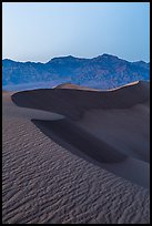 Sand dunes and Amargosa Range at dusk. Death Valley National Park ( color)