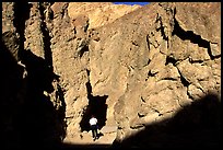 Hiker in Golden Canyon. Death Valley National Park, California, USA. (color)
