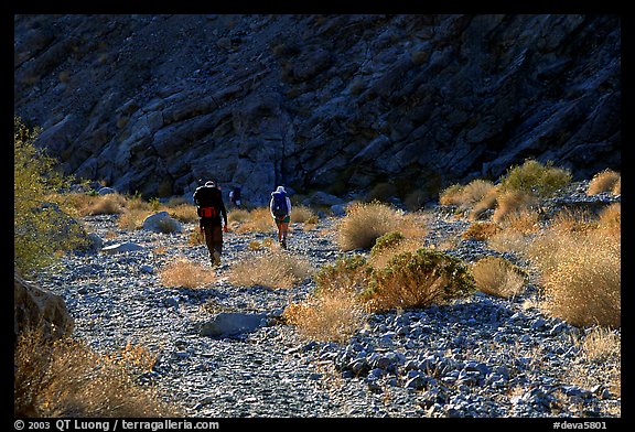 Hikers in a side canyon. Death Valley National Park (color)