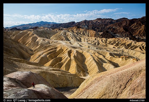 Visitor looking, Zabriskie Point. Death Valley National Park (color)