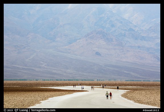 Tourists walking onto Salt Pan at Badwater. Death Valley National Park (color)