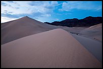 Ibex Sand Dunes and mountains at dusk. Death Valley National Park ( color)