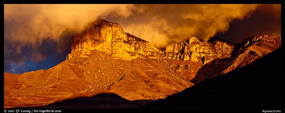 Cliffs and clouds illuminated by low sun. Guadalupe Mountains National Park, Texas, USA.