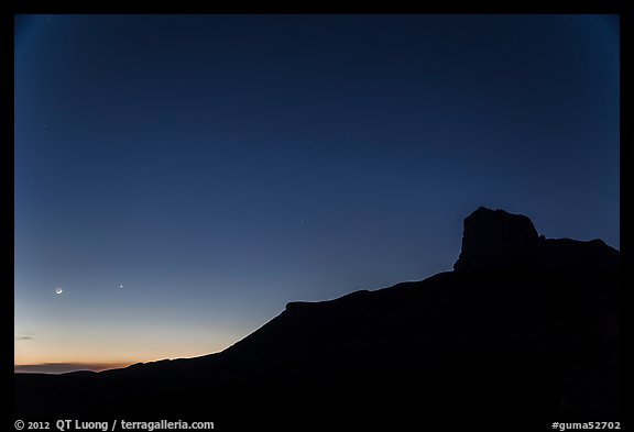 El Capitan profile and moon at dusk. Guadalupe Mountains National Park, Texas, USA.