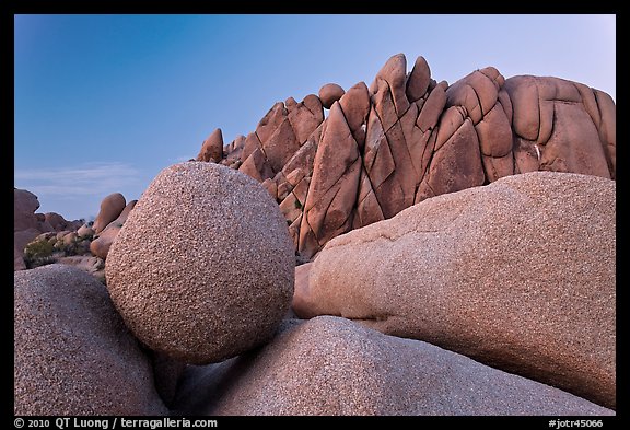 Round granite boulder and triangular rocks, dusk. Joshua Tree National Park (color)