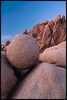 Spherical granite boulder and angular rocks, twilight. Joshua Tree National Park ( color)
