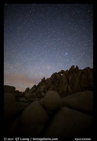 Marble rocks under clear starry sky. Joshua Tree National Park (color)