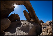 Arch Rock and sunstar. Joshua Tree National Park ( color)