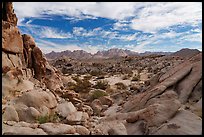 Granite rock piles and Coxcomb Range. Joshua Tree National Park ( color)