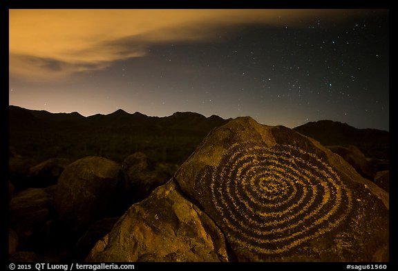 Petroglyphs on Signal Hill and Tucson Mountains at night. Saguaro National Park, Arizona, USA.